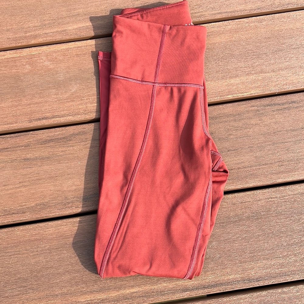 Burgundy Athleta Lightning 7/8 tight leggings